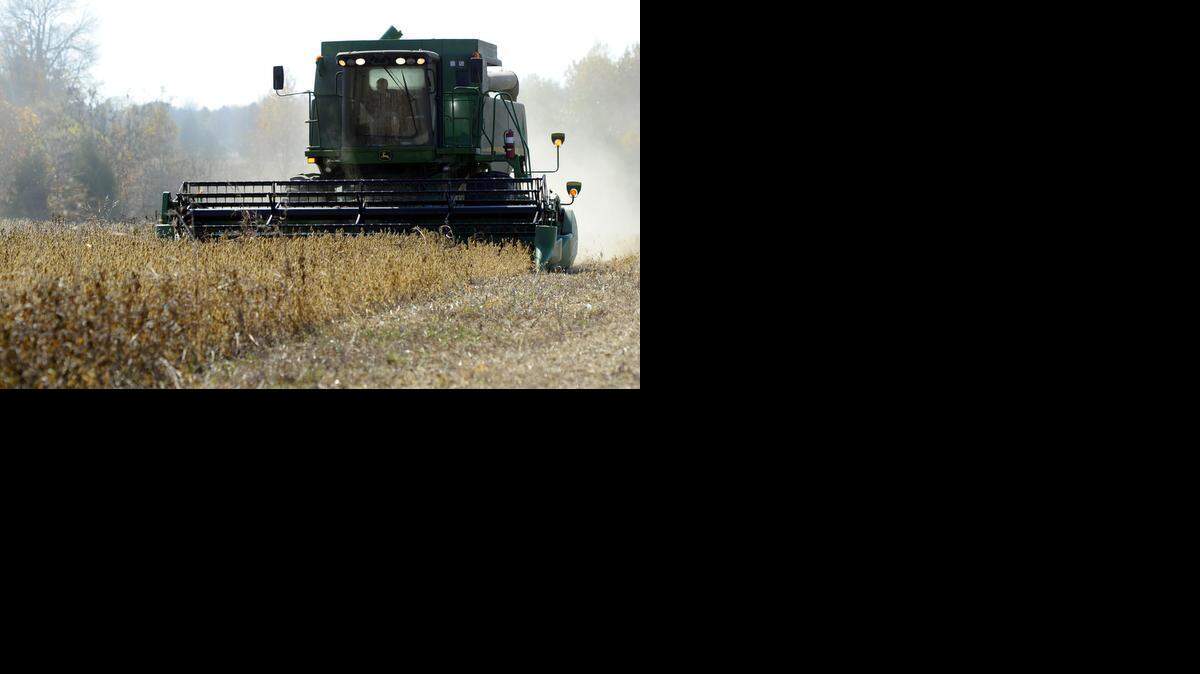 Myra Morrison operates a combine on her land in Cabarrus County, where opposition grew to Charlotte Water’s spreading sewage sludge on farmland.