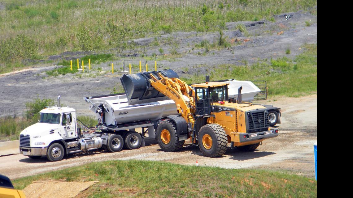 
The first excavated coal ash left Duke Energy’s retired Riverbend power plant near Charlotte in May. The ash was moved to a lined landfill.
