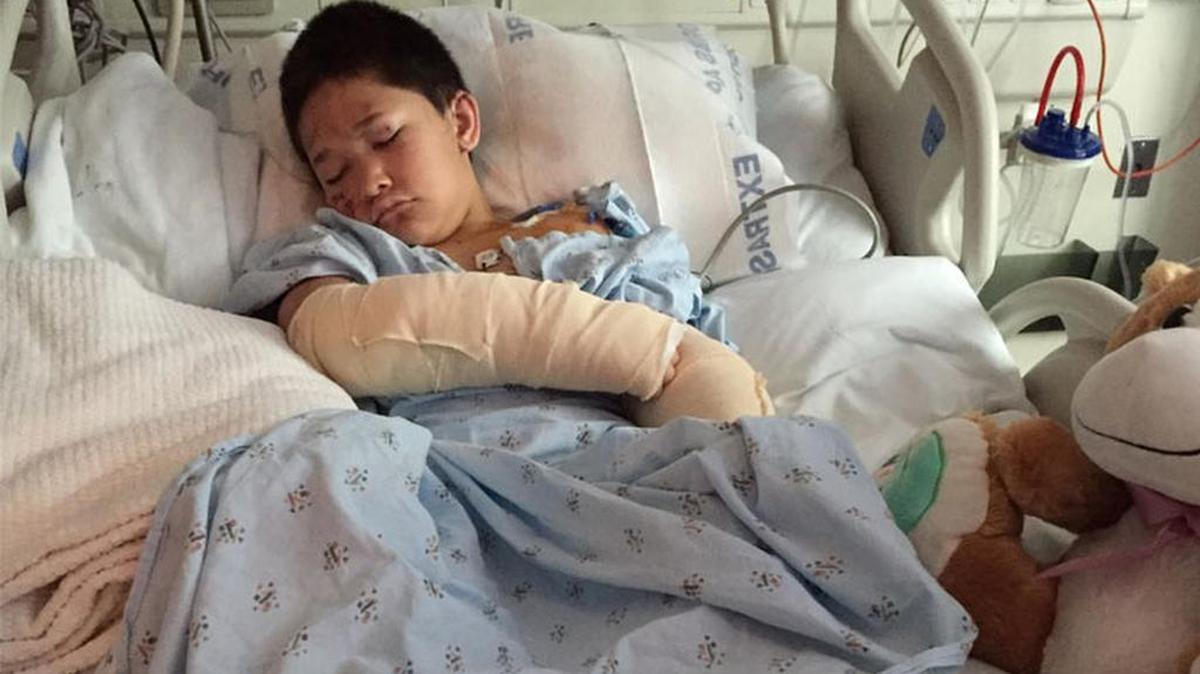 Jonathan Robero, 9, is recovering at Carolinas Medical Center from a pit bull attack.