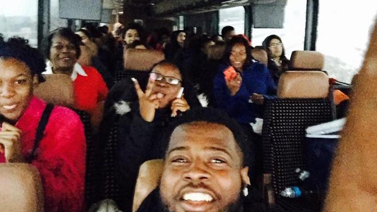 Carolina Panthers defensive tackle Kawann Short on bus with high school students from his hometown East Chicago, Ind., headed for a college fair at Short’s alma mater, Purdue University.