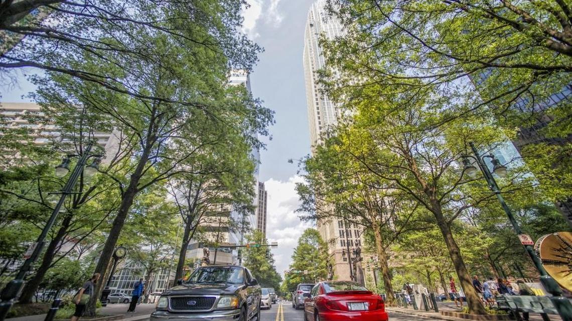 Tryon Street near the intersection of Trade Street in Charlotte. New York, South Carolina and Florida were the top three states for people who relocated to Mecklenburg County, according to the U.S. Census Bureau.