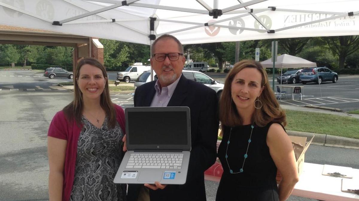 
St. Stephen United Methodist Church is donating 140 laptop computers to Greenway Park Elementary. Shown here with an example of the Hewlett Packard Chromebooks are Anna Rusconi, principal at Greenway Park, Mark Casper, chairman of the Missions Team, and Susan Courtney, co-chair of the “Claiming His Vision” campaign.
