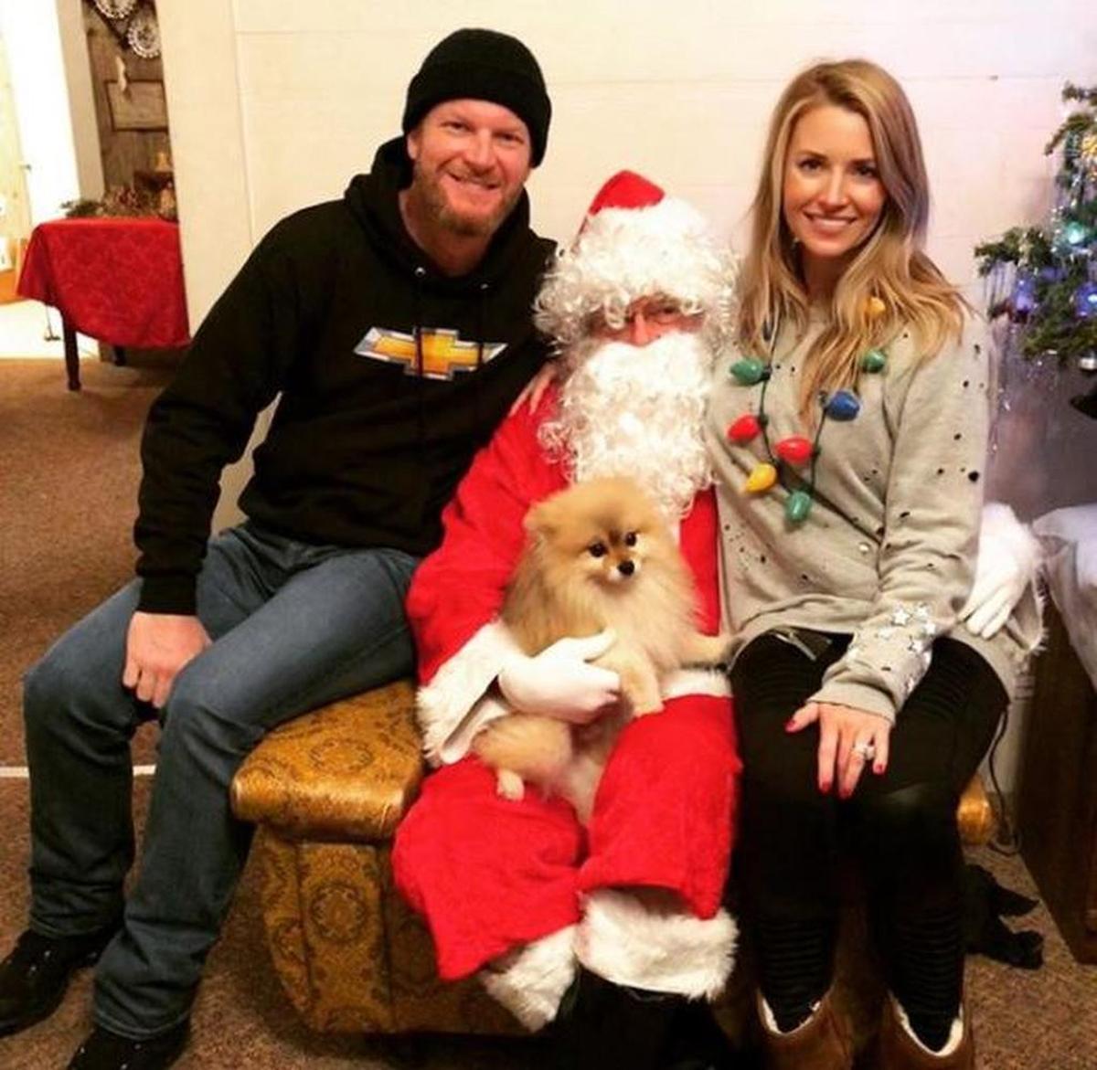 Earlier this week, Amy Earnhardt posted a portrait on Instagram of her and her husband, Dale Earnhardt Jr., with Santa.