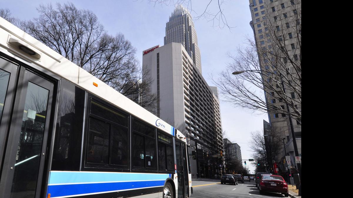 
A CATS bus heads along Trade Street in uptown Charlotte. 
