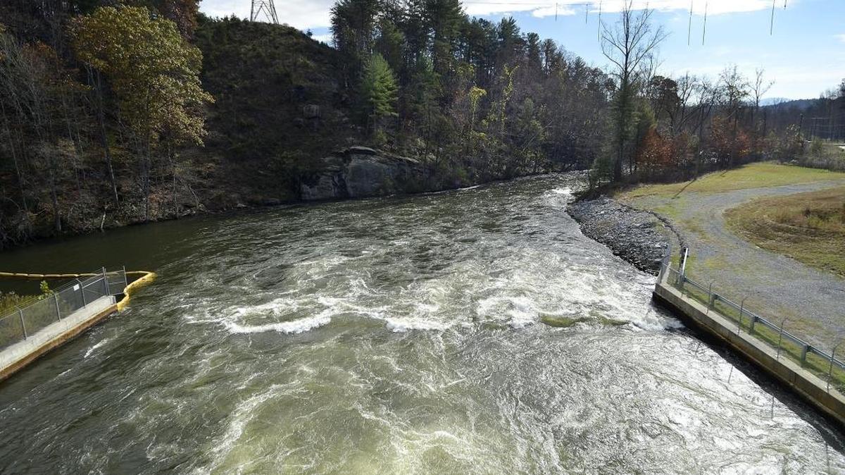 Water pours into the Catawba River from the bottom of Lake James near Morganton.