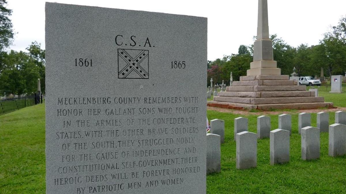 This monument, erected in 1977 by the Confederate Memorial Association of Charlotte, stood at Old City Hall on Trade Street, before it was moved to city-owned Elmwood Cemetery, where a granite obelisk honoring Confederate soldiers overlooks veterans' graves. Charlotte-Mecklenburg police announced Tuesday officers will monitor the city’s Confederate monuments after unrest in Charlottesville, Va. over the weekend.