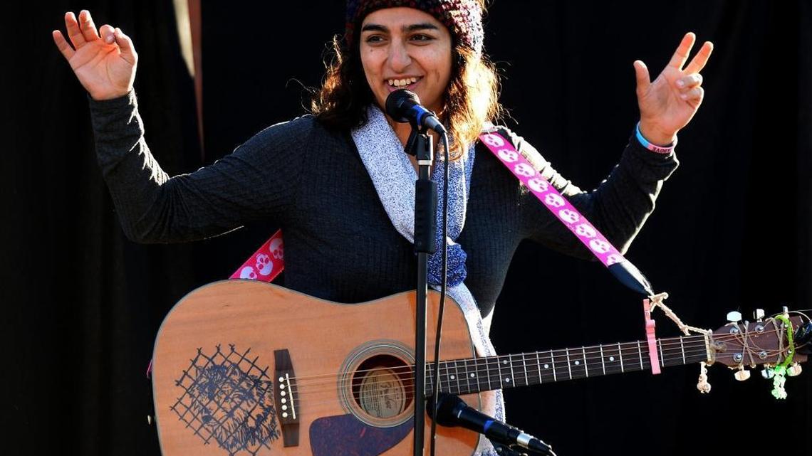 Lara Americo, transgender activist and artist, at LoveWinsCLT rally to support immigrants, Muslims, LGBT people.