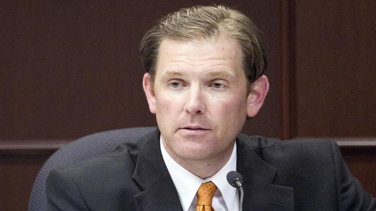 
Raleigh police officer Matthew Kohr ponders a question as he testifies on the witness stand in his case in a Wake County courtroom in Raleigh on May 6, 2015. He is suing Starbucks after he burned himself when a cup of coffee spilled on him. 
