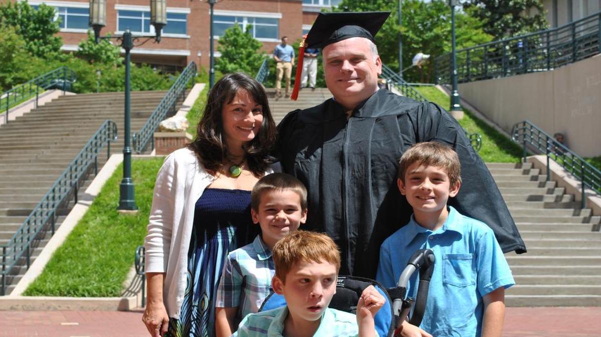 
Ryan McCall with wife Vanessa Infanzon and sons Sean, left, Ben, middle, and Logan, right. In 1991, Ryan McCall started his academic journey at UNC Charlotte that didn’t end until Saturday afternoon when he received his electrical engineering degree during the last of three commencements over two days. 
