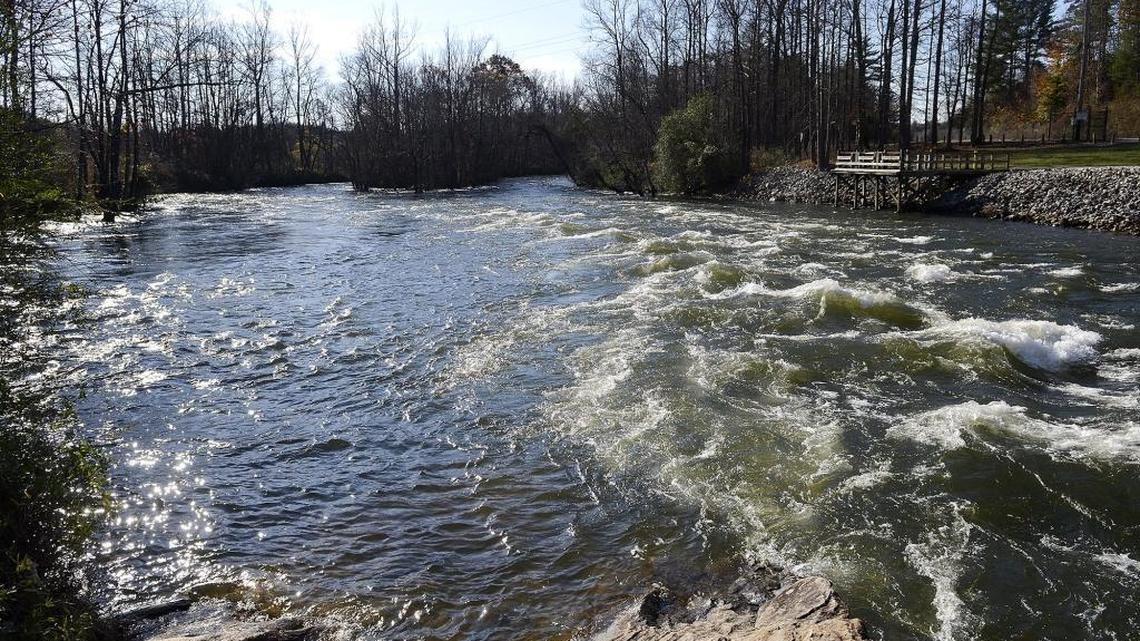 Water pours into the Catawba River from the bottom of Lake James at the Linville Dam near Morganton.