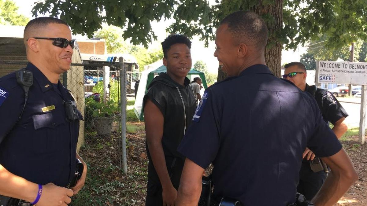 Charlotte-Mecklenburg Police has six community officers who focus on relationships instead of arrests in the Eastway Division. Officer Paul Benloss, right, and Lt. Steven Durant, left, meet with Keshawn Cherry, middle, on Thursday in the Belmont neighborhood. Benloss and other CMPD officers have been mentoring Cherry, who is now in high school and has a part-time job.