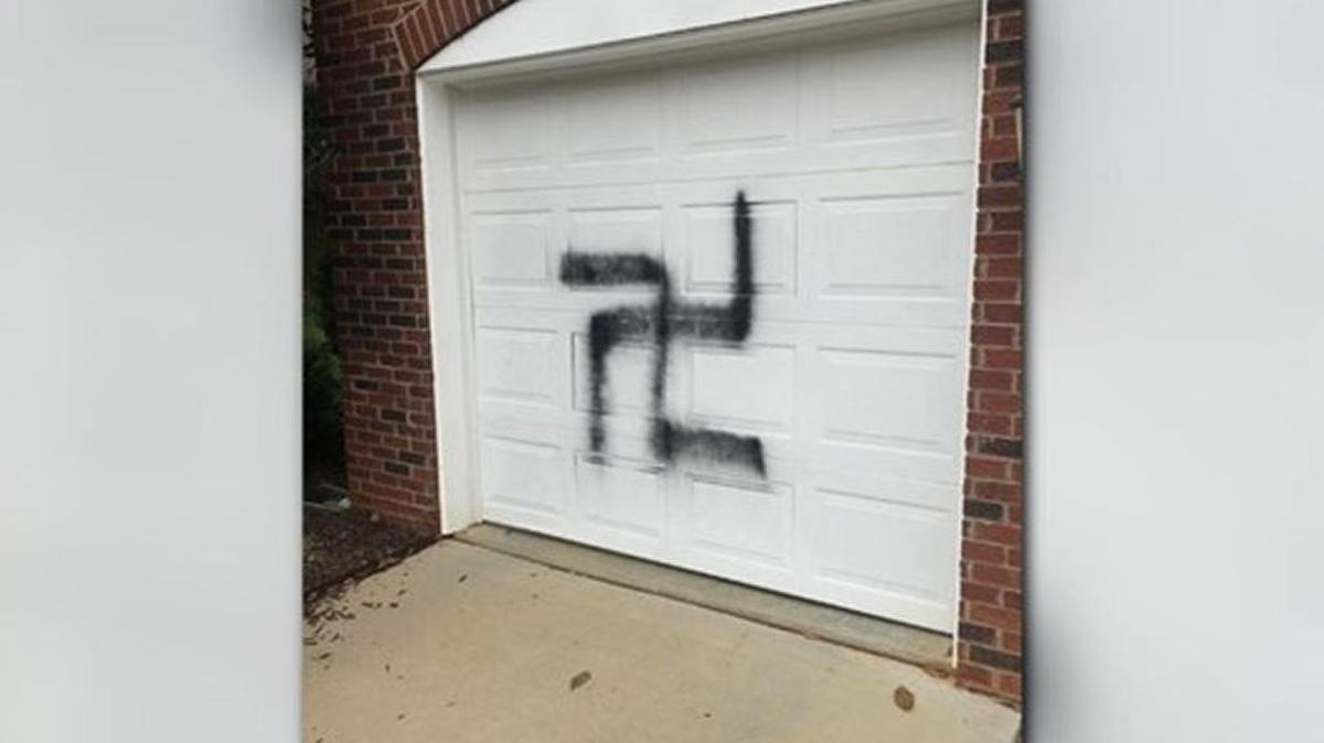 Offensive image spray painted on family’s garage door in Charlotte.