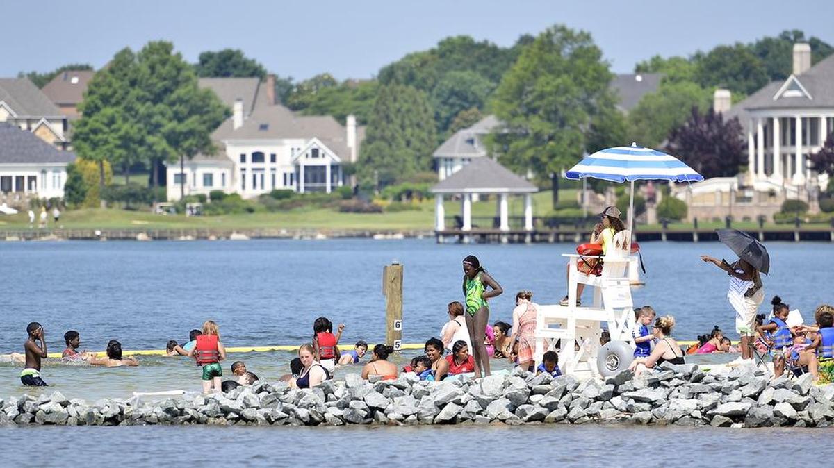 Families enjoy Ramsey Creek beach on Lake Norman in this 2017 Charlotte Observer file photo.