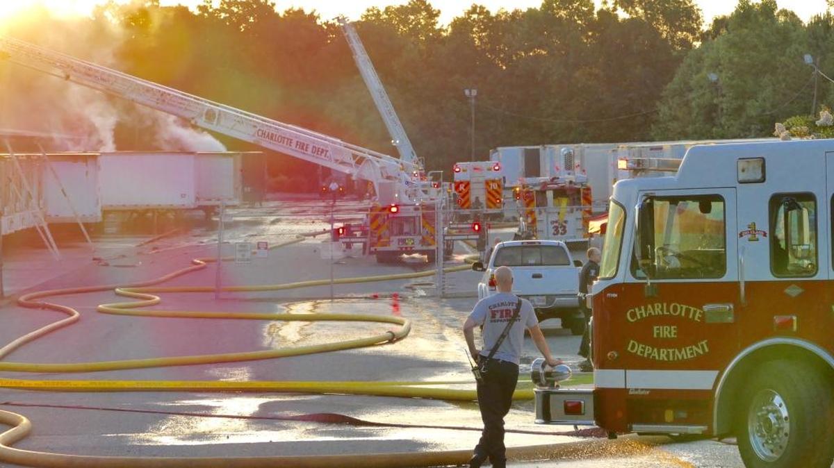 Five workers were injured in an explosion and fire at a trucking company warehouse in north Charlotte on Wednesday morning, Capt. Dennis Gist of the Charlotte Fire Department said.