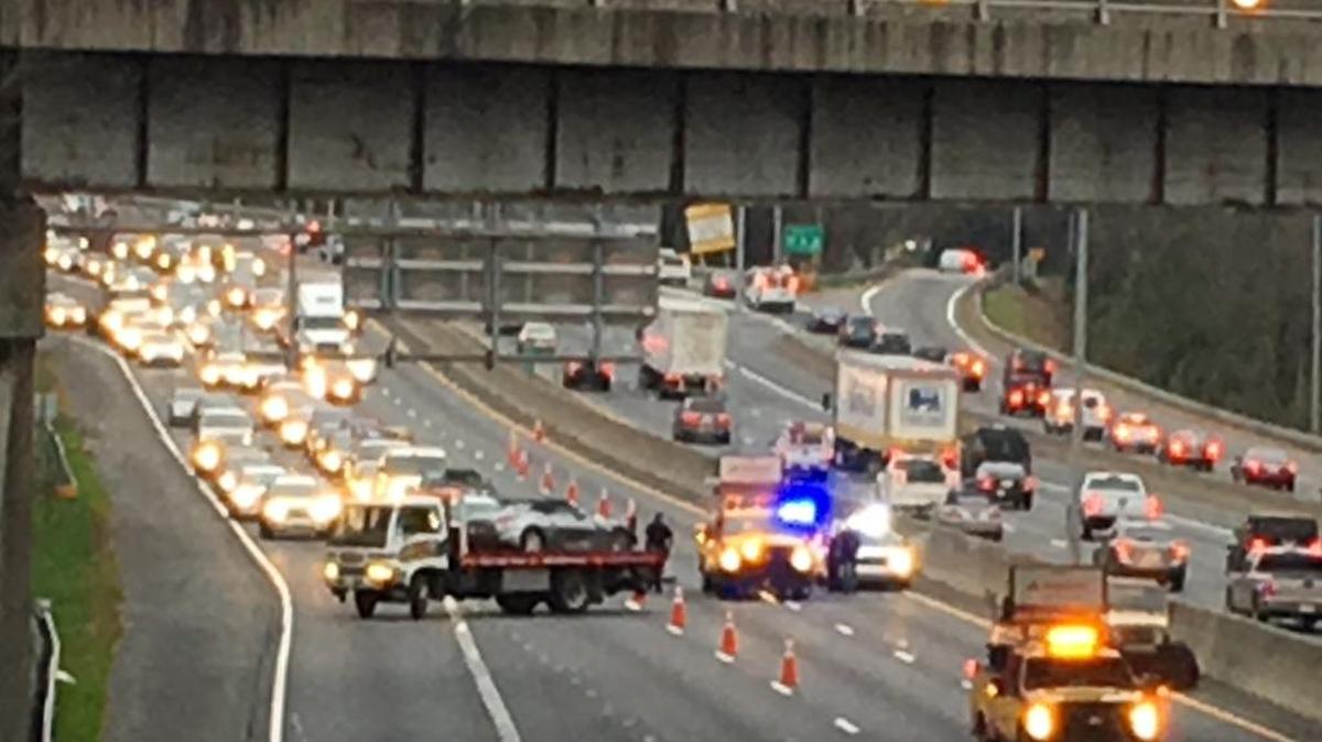 Traffic stopped on northbound I-77 near uptown as vehicles are towed after a wreck