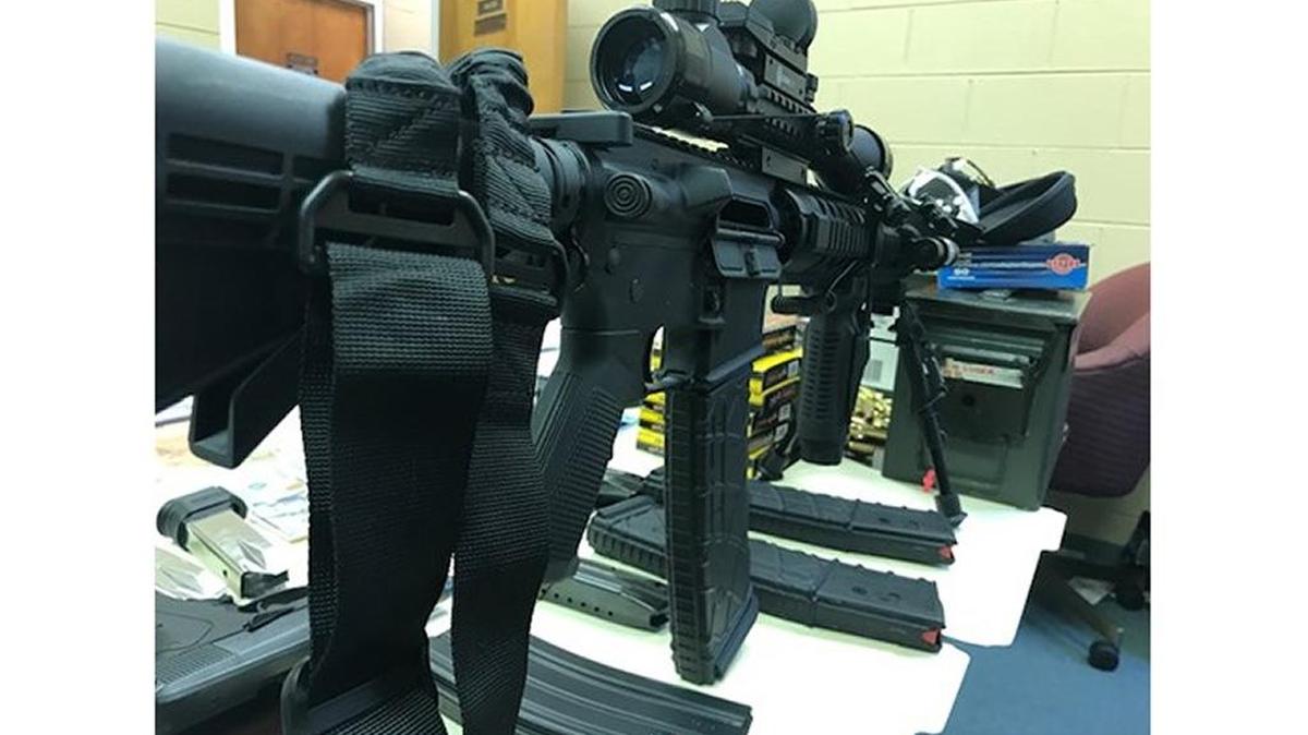 Weapons were found in the home of a man who escaped Ranlo Police custody Monday night.