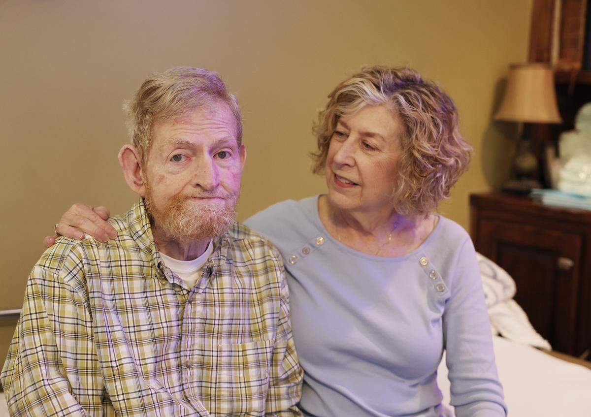 Leigh Anne Staton takes care of her husband, Eric, in their Gastonia home. AARP finds many North Carolina caregivers endure debt, stopped savings and unpaid bills.
