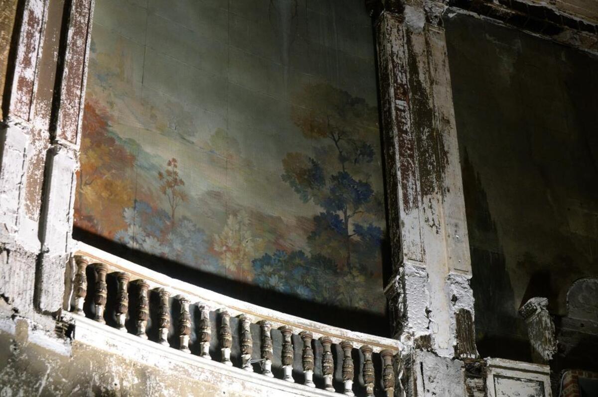 Details of a wall mural can still be seen on some of the interior walls of the closed Carolina Theatre.
