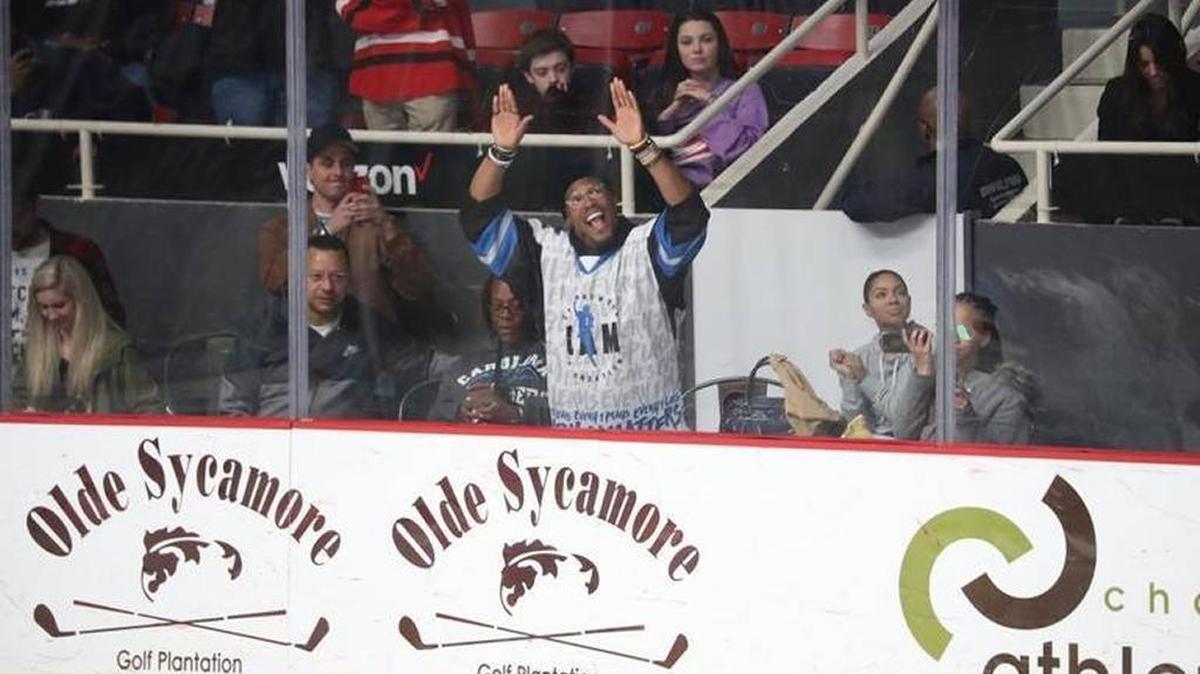 Cam Newton wore one of his Checkers jerseys to the Charlotte Checkers last month. You can own one, if you bid well on eBay.