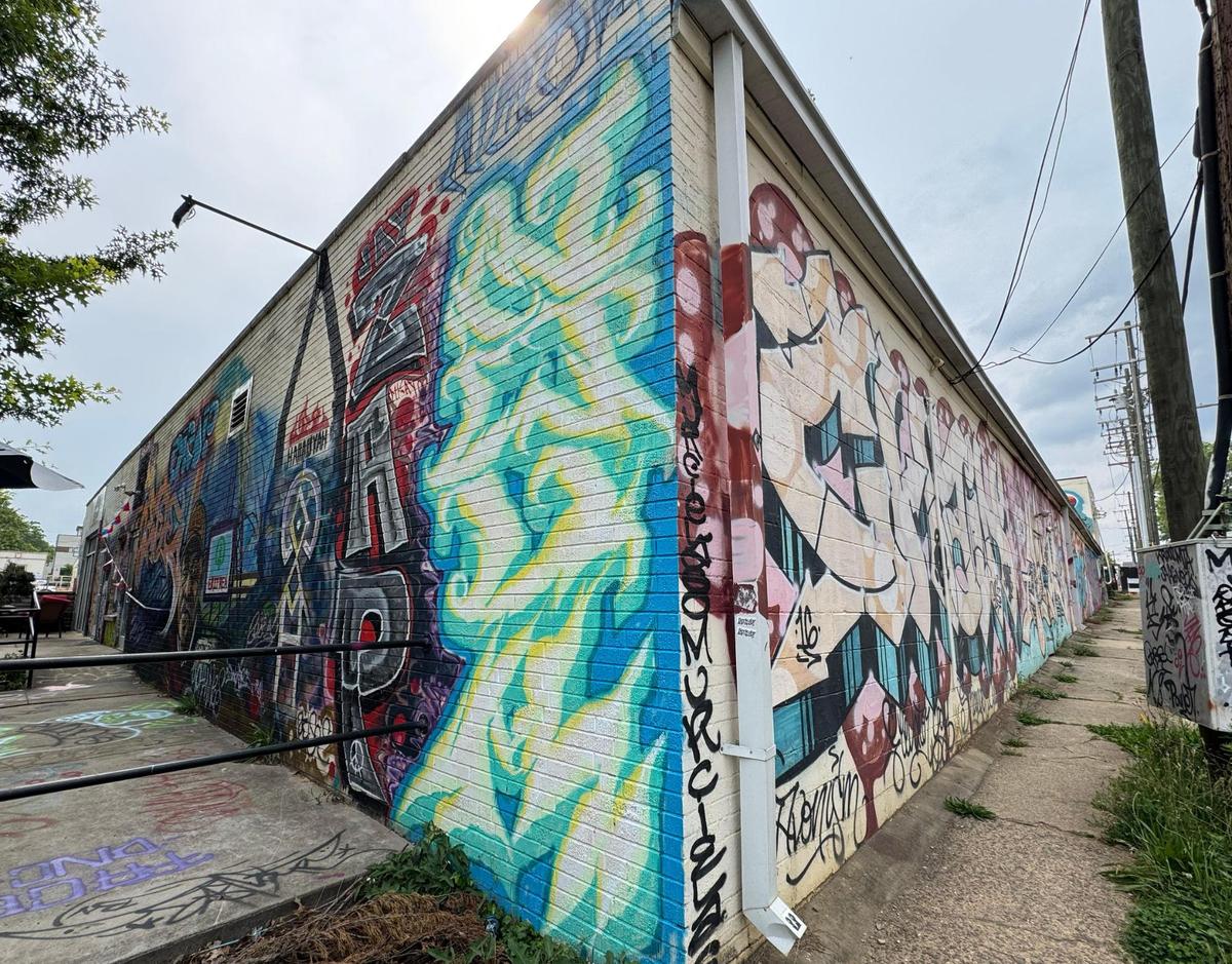 A mural greets passer-bys at the former Noda Market & Deli in the Optimist Park section of Charlotte