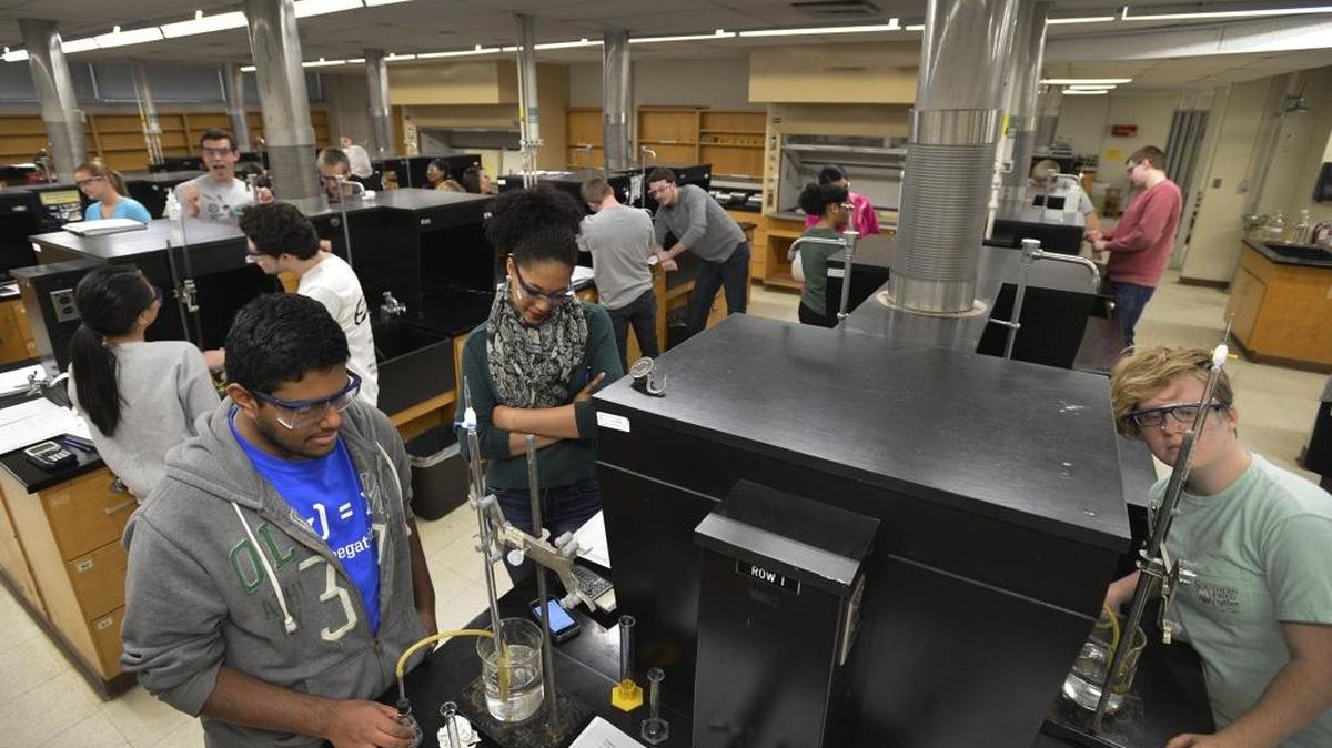Students at work inside a chemistry lab inside the Burson building at UNC Charlotte. An upcoming bond referendum will pay for a new science building to replace the current outdated facility.