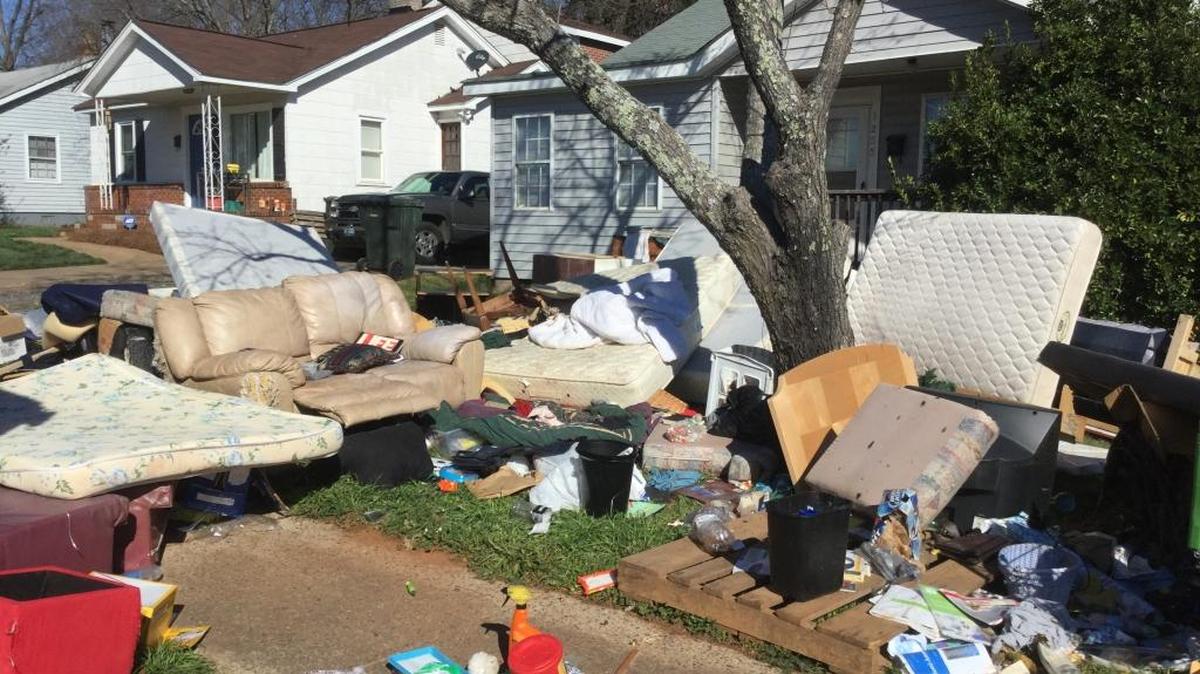 An 84-year-old military veteran was among the people evicted from this Eden Terrace house. The belongings were put outside last week, then hauled off Monday.