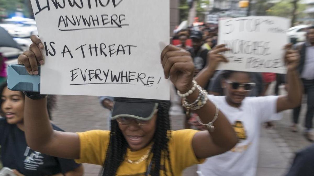 Protesters marched across uptown this week. For more ways to get involved, the Observer sought out area experts to suggest a variety of steps people can take right now.