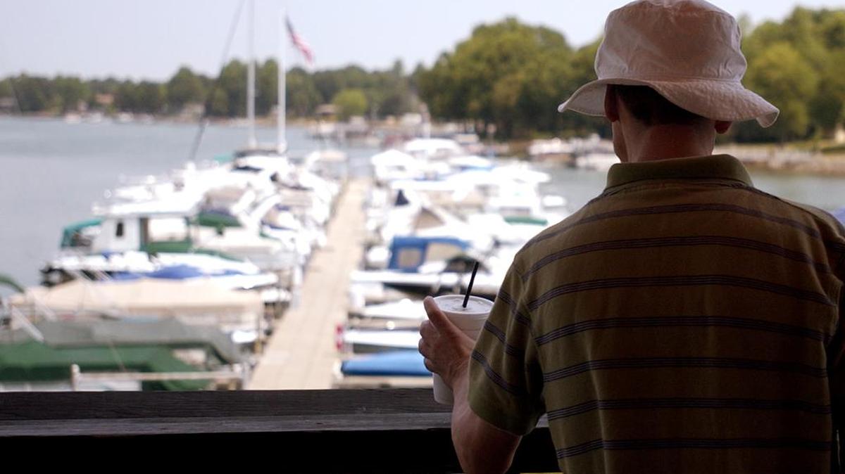Boats docked outside The Rusty Rudder Lake Norman in Cornelius