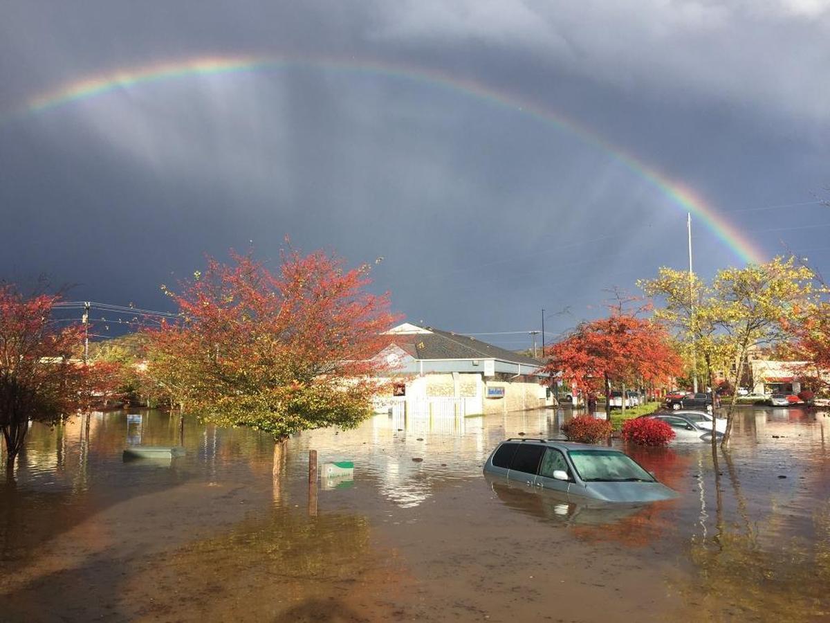 A rainbow arcs above Boone after Monday’s storms brought flooding to the mountain town.