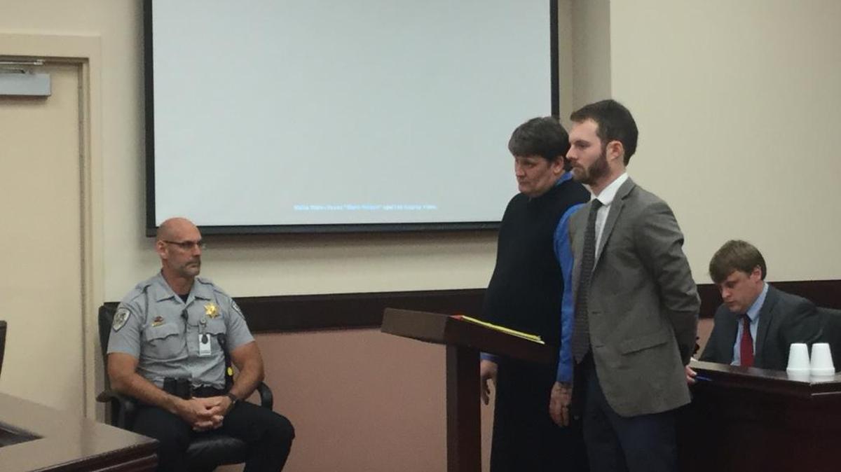 James “Jamie” Giles, center in sweater, next to his lawyer, Matt Burgess, in court Monday. Giles, 40, was sentenced to six years in prison for beating a 3-year-old he was babysitting in 2016.