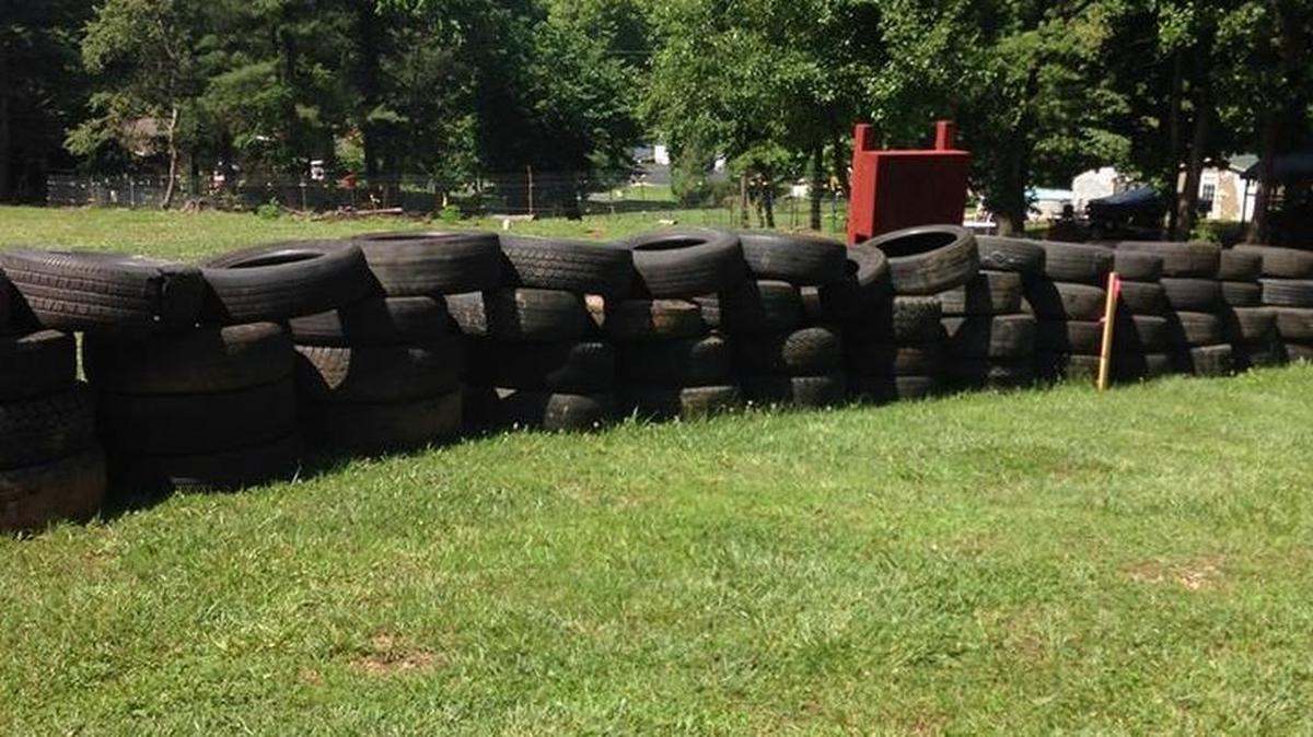 Is this a work or art or an eyesore? Neighbors near Marion, N.C., disagree on the subject of the tires that stand between their properties.