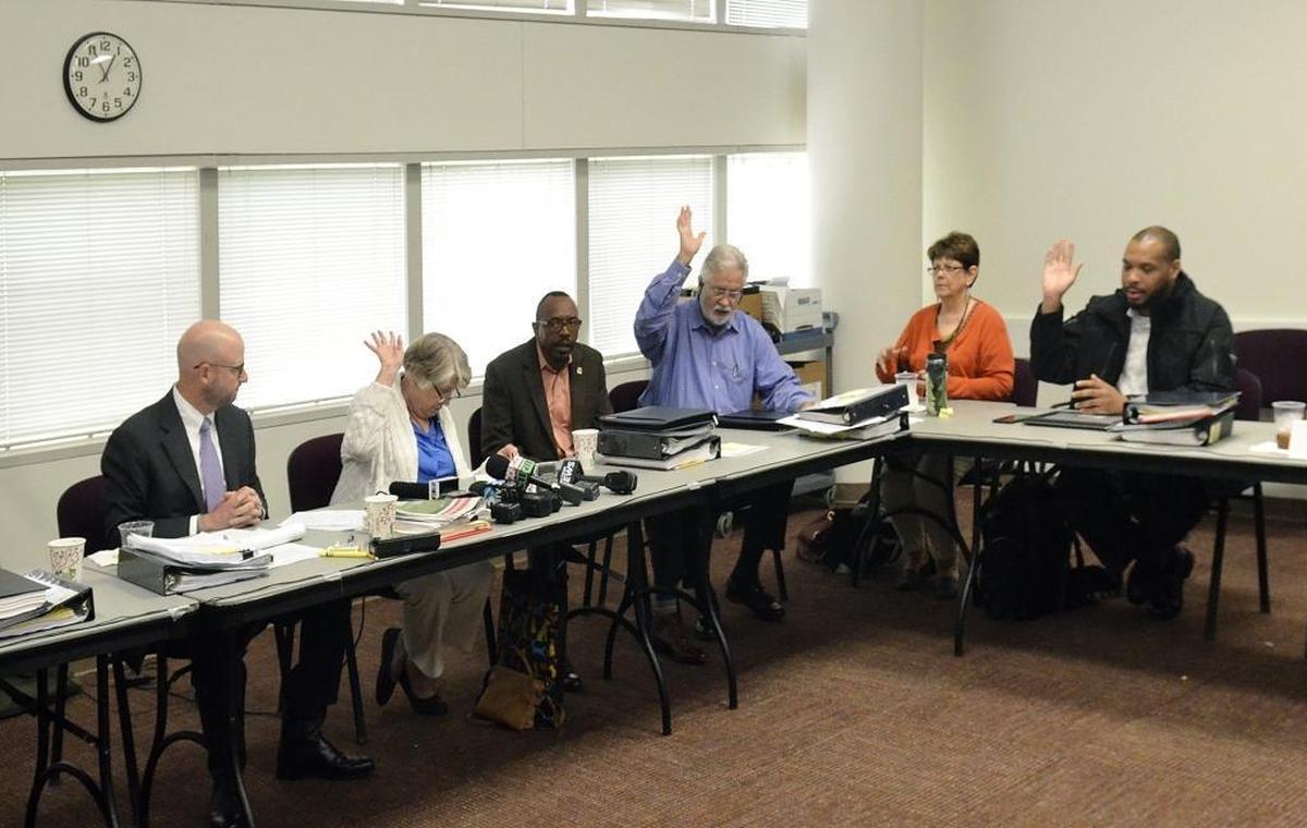 The Citizens Review Board on August 10 voted in secret on Keith Scott’s case and announced they reached a tie over whether CMPD Chief Kerr Putney acted correctly to not discipline the polie officer who shot and killed Scott. Here, the board votes to adjourn.