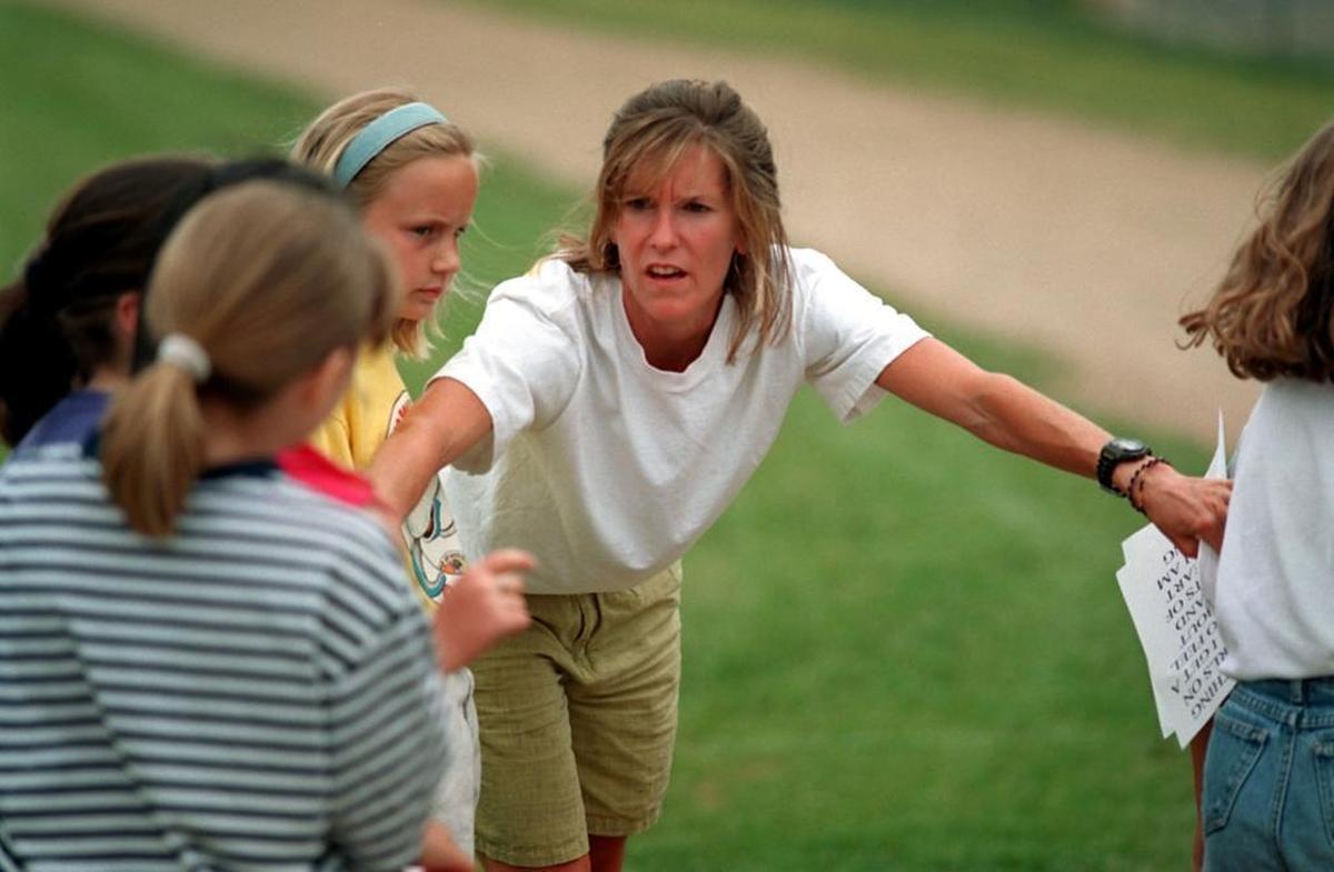 Molly Barker coaches a Girls on the Run group at Charlotte Country Day in 1997, a year after founding the organization.