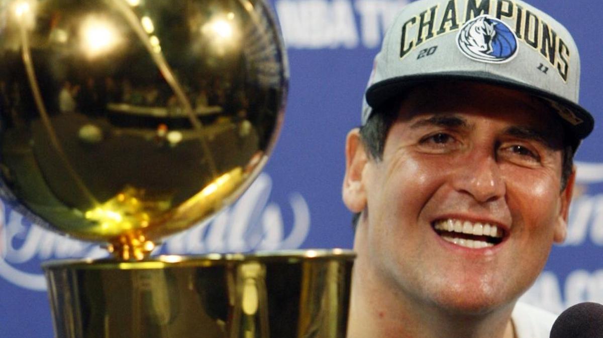 Dallas Mavericks owner Mark Cuban smiles during a news conference after Game 6 of the NBA Finals basketball game against the Miami Heat Sunday, June 12, 2011, in Miami.