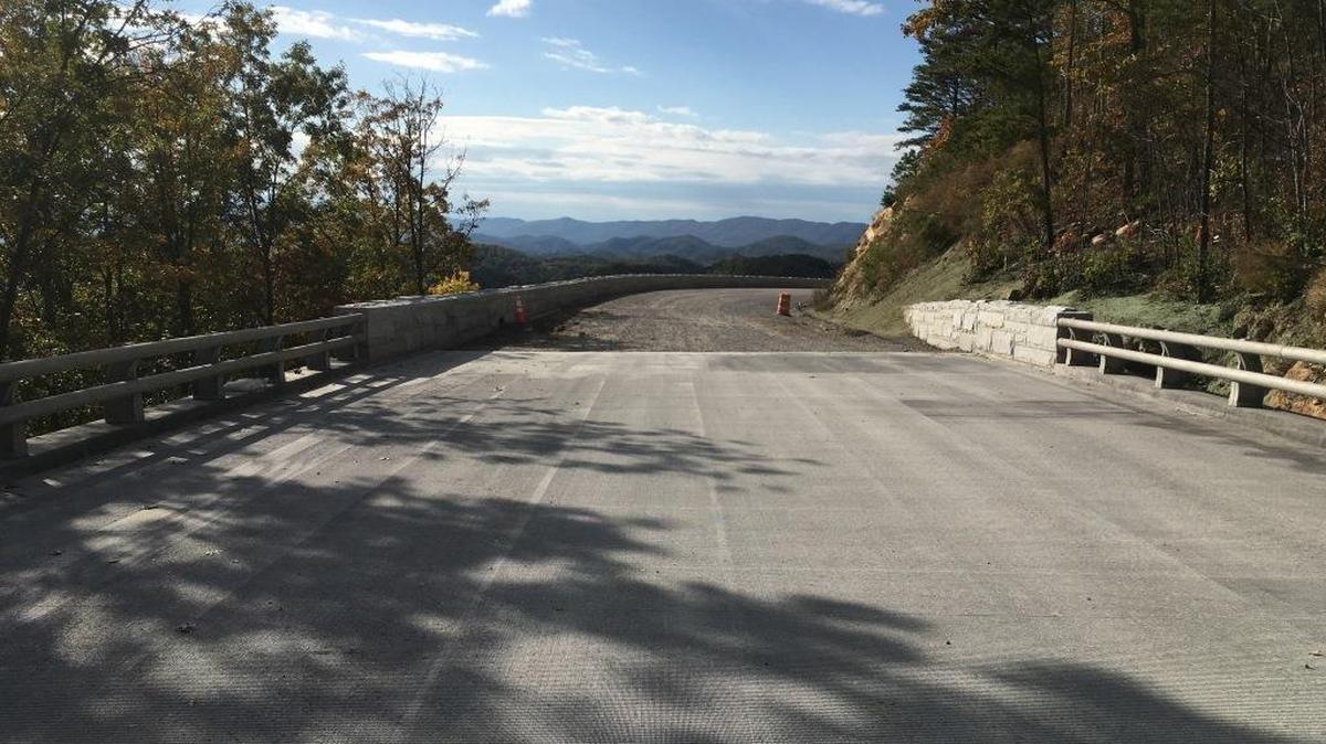 Charlotte’s Lane Construction Co. has finished seven years of work to build five bridges in a “missing link” of the Foothills Parkway in Great Smoky Mountains National Park.