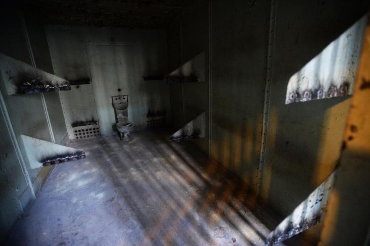 One of the eight-person cells at the long-defunct Mecklenburg jail, which spanned the years from the late 1920s to the late 1960s. Most of the jail has remained untouched like a time capsule since then, so you can still see graffiti left by inmates 50 years ago.