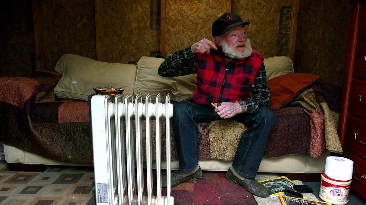 
Ronnie "Dancing Bear" Pierce’s temporary housing in Sheila Robinson’s backyard toolshed has become permanent. “There is something about Bear, an almost childlike innocence that makes you want to help him,” said Robinson, who shares her meals with him. Pierce has been kicked out of several shelters because of his drinking, and he still can be disruptive. “He is not permitted in the house when he’s drinking like that,” Robinson said. 
