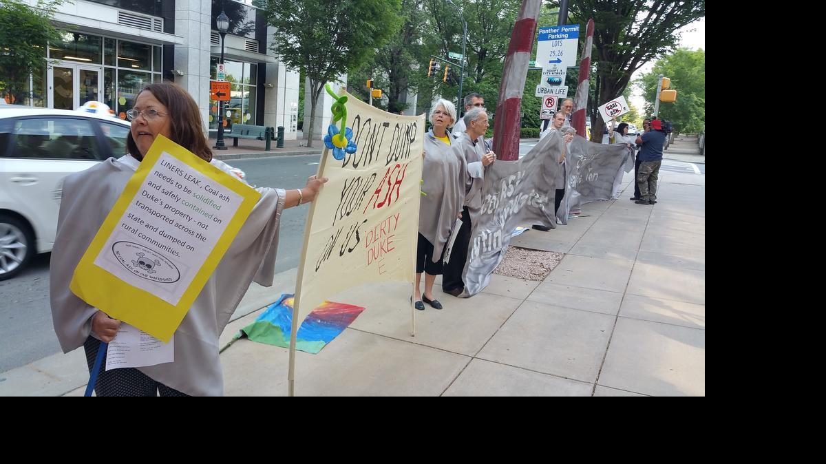 
Members of 10 environmental organizations rallied Thursday, May 7, 2015 outside Duke Energy’s annual shareholder meeting. 
