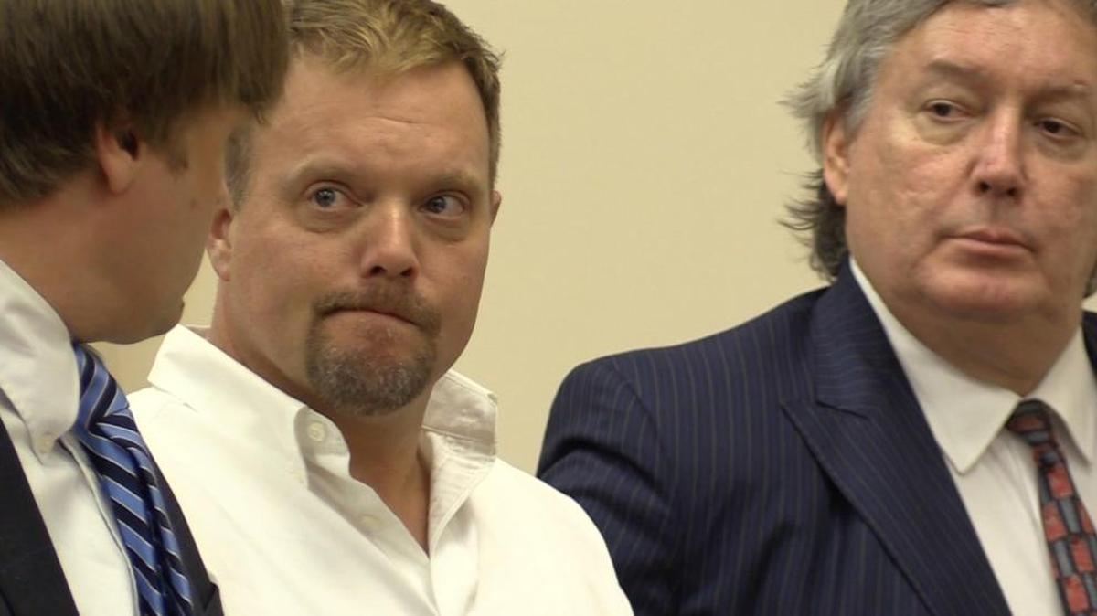 Bradley Hensley, center, was sentenced Thursday to eight years in prison for shooting a friend three times whom Hensley’s lawyers alleged was in a “love triangle” that prompted the shooting. Seated is defense lawyer Michael Brown and standing to Brown’s left is defense lawyer Zachary Merritt.