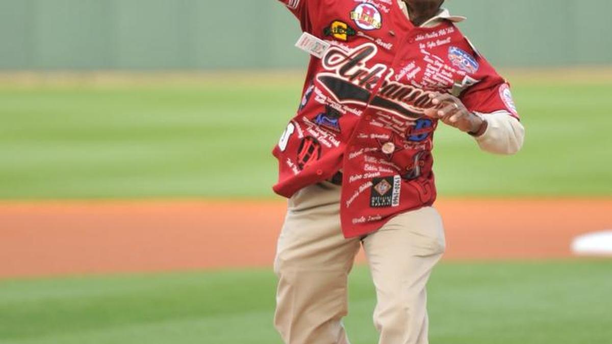 Ray Banks throw out a pitch at last year’s Charlotte Knights event honoring Negro League ball players.