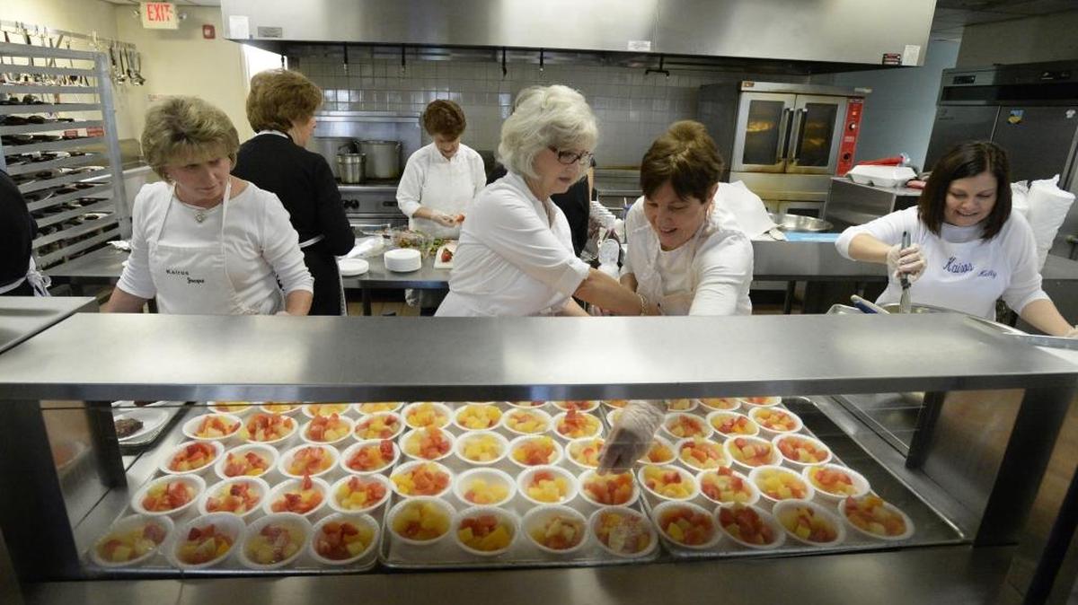 The Salvation Army of Greater Charlotte plans to expand shelter options for family, after receiving a $5 million grant from Amazon founder Jeff Bezos and his wife MacKenzie’s Day 1 Families Fund. Seen here, volunteers cooked in the kitchen at the Salvation Army Center of Hope shelter last year.
