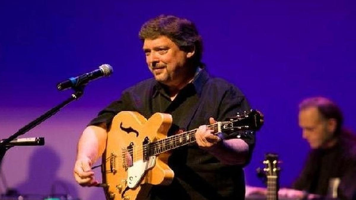 
John Tosco, who founded and has led the Tosco Music non-profit for more than two decades, performs at one of his popular music parties. His organization stands to lose more than half of its projected income this year because of canceled events, including a huge Beatles tribute weekend.
