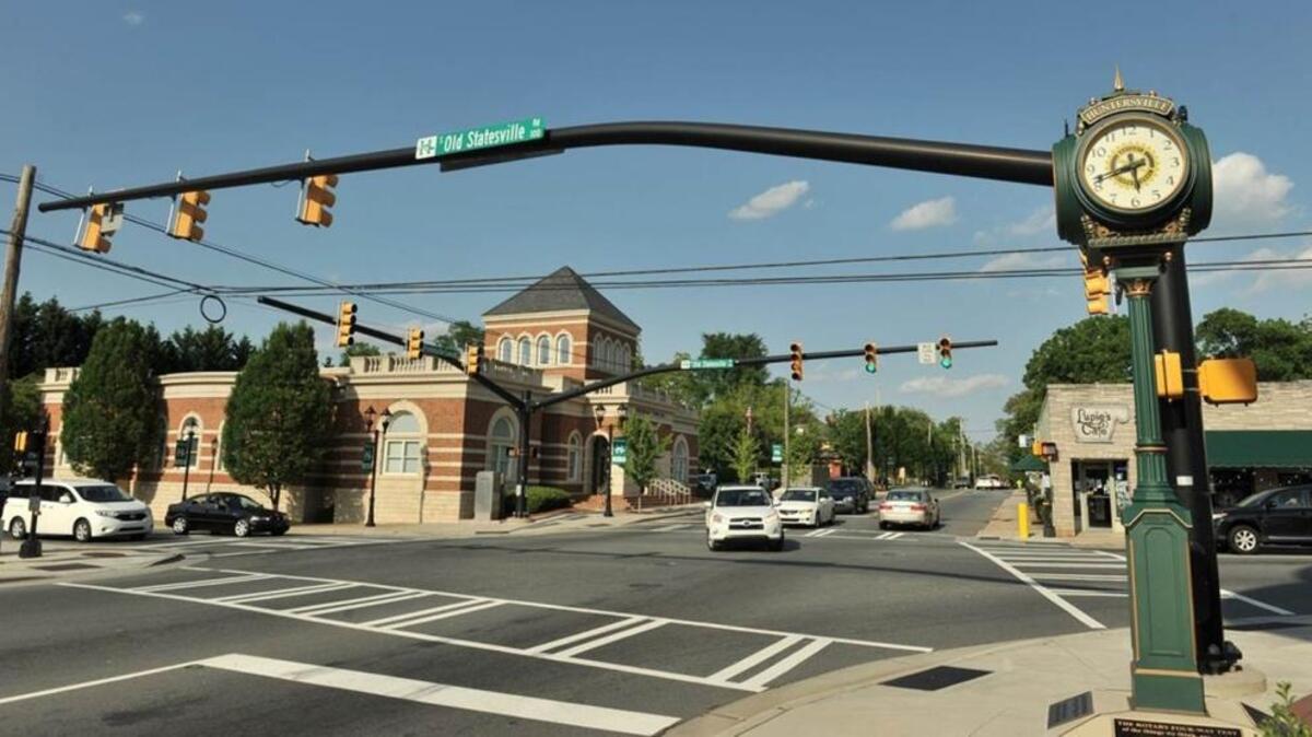 Studies are trying to understand why large numbers of a rare eye cancer have been reported in the small town of Huntersville.
