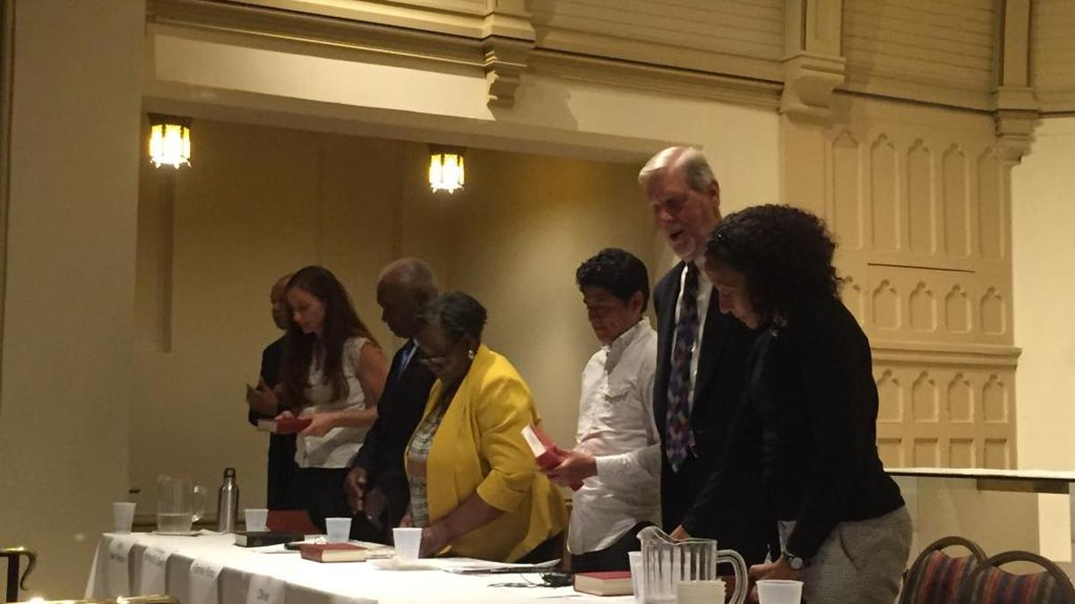 Community members and local leaders gathered at St. Peter’s Episcopal Church to discuss racial justice, focusing on Charlotte’s specific challenges with housing and education.