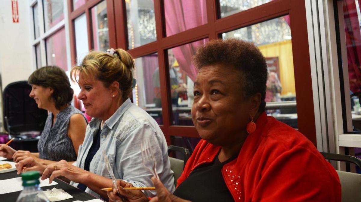 Judge Paulette Gaither, right, said she had been converted to “SPAMism” during the Great American SPAM Competition on Saturday at the N.C. State Fair in Raleigh.