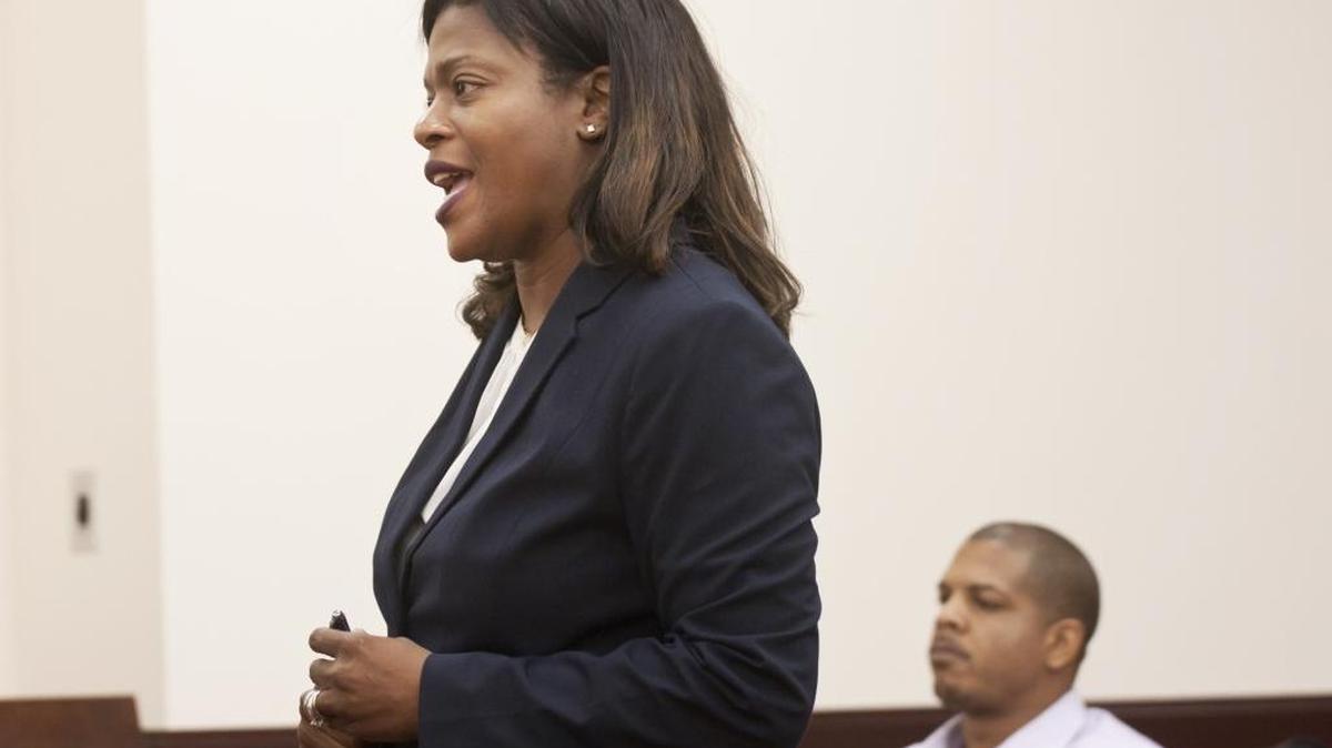 Defense attorney Twana Burris-Alcide, left, asks Judge Lewis Daniel Malphrus Jr. to find no probable cause exists to send former Northwestern High School assistant principal Kenneth Andrew Williams, right, to trial for disseminating obscene material to a minor.