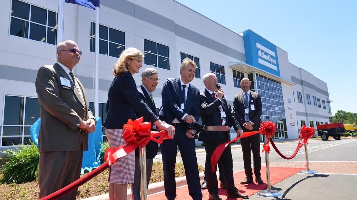 Atlas Copco President and CEO Mats Rahmstrom cuts the ribbon at the May 17 grand opening of the Atlas Copco production facility at 1059 Paragon Way in Rock Hill.