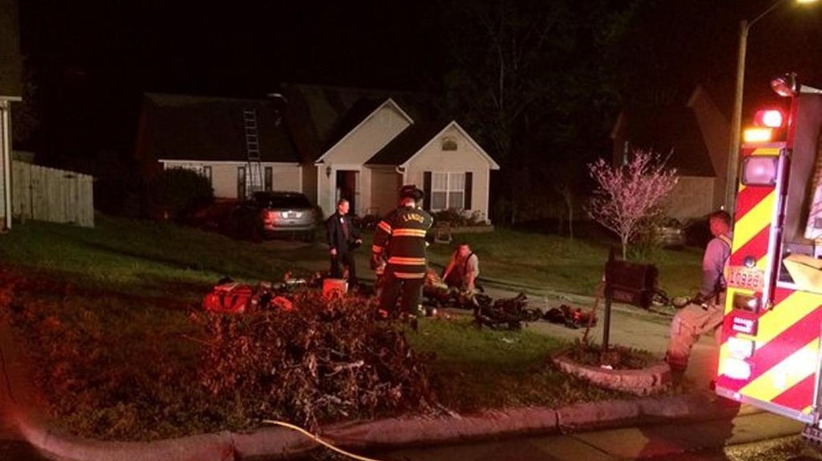 Firefighters credit a family’s dogs with helping the family escape a house fire in the Remmington Estates neighborhood in Kannapolis late Thursday.
