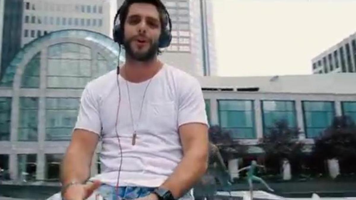
Country singer Thomas Rhett sings in front of Wells Fargo Plaza in uptown Charlotte during a music video filmed in August.
