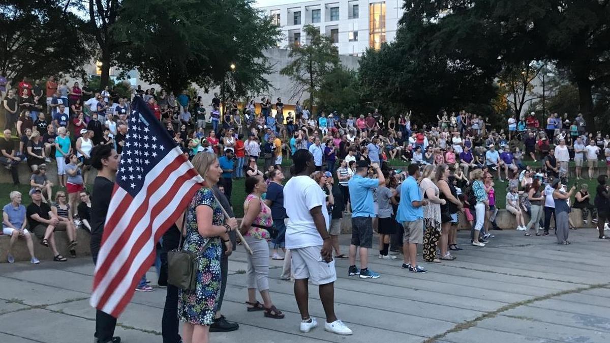 People gather in Marshall Park on Sunday for a Vigil for Charlottesville.
